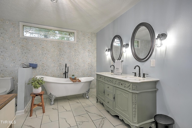1108 Glen St, Bristol, TN 37620 - bathroom featuring double vanity, a freestanding tub, and marble finish flooring