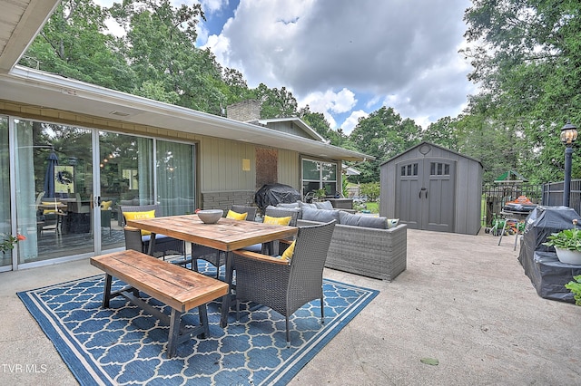 1108 Glen St, Bristol, TN 37620 - view of patio with a storage shed, outdoor dining area, and an outdoor living space