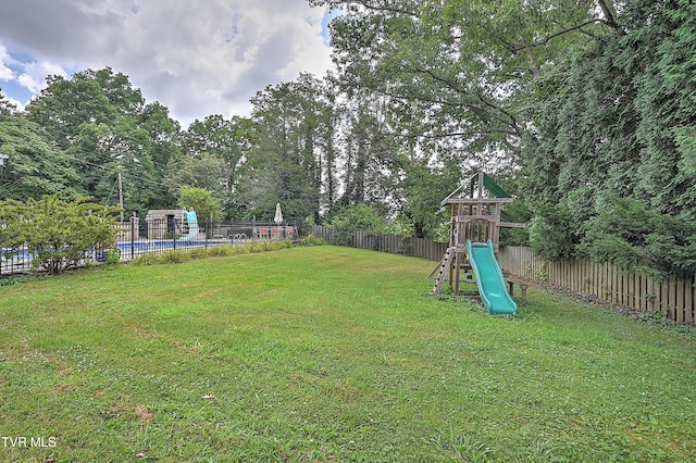 1108 Glen St, Bristol, TN 37620 - fenced backyard with a playground