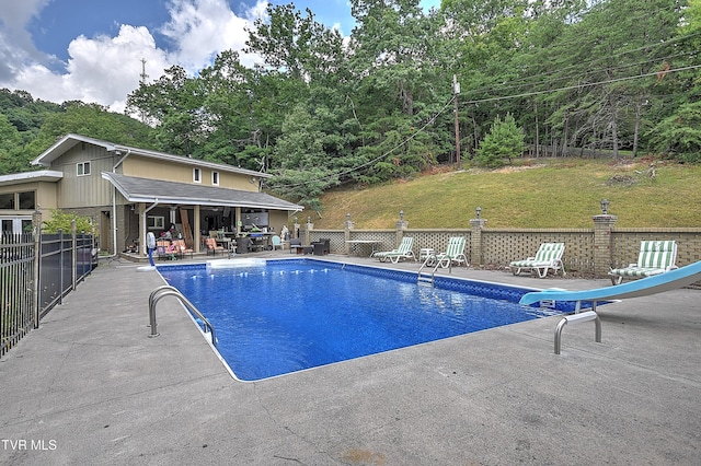 1108 Glen St, Bristol, TN 37620 - view of pool with a water slide, a patio, and a diving board