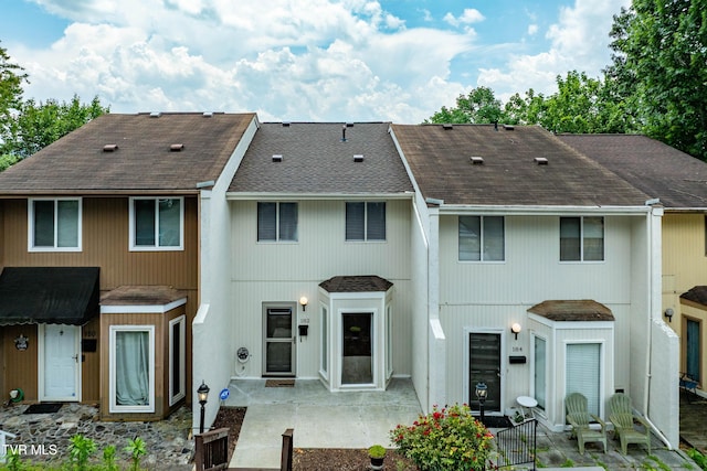 182 Sierra Pl Unit 182, Bristol, VA 24201 - view of front of property with a shingled roof and a patio