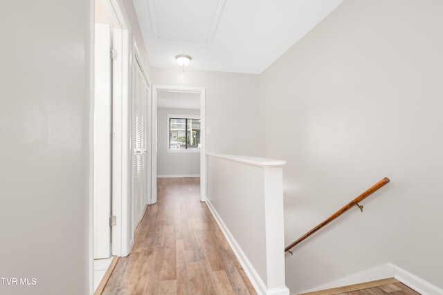182 Sierra Pl Unit 182, Bristol, VA 24201 - hallway with an upstairs landing, attic access, and light wood-style flooring