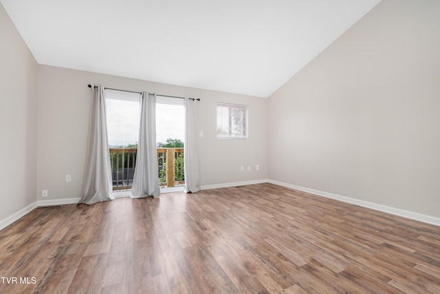 182 Sierra Pl Unit 182, Bristol, VA 24201 - spare room with wood finished floors and vaulted ceiling