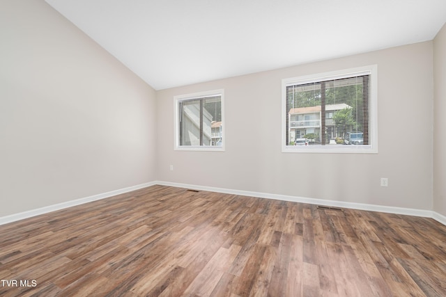 182 Sierra Pl Unit 182, Bristol, VA 24201 - unfurnished room featuring wood finished floors and lofted ceiling