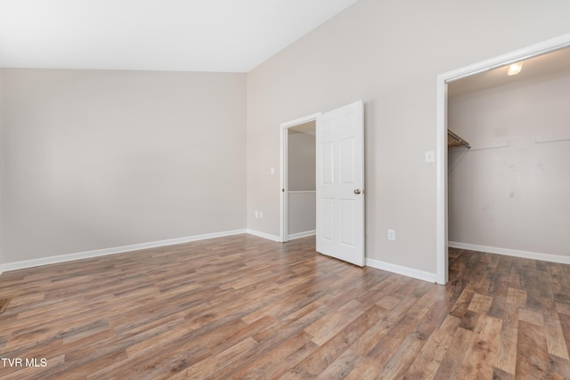 182 Sierra Pl Unit 182, Bristol, VA 24201 - unfurnished bedroom with wood finished floors and a walk in closet