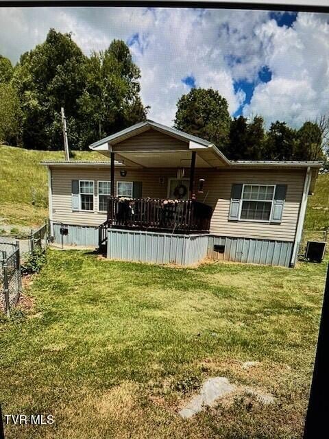 402 Beeline Rd, Duffield, VA 24244 - back of property with a lawn and a porch