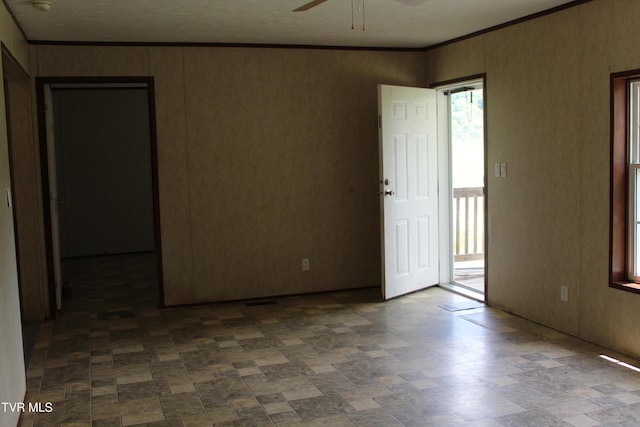 402 Beeline Rd, Duffield, VA 24244 - spare room featuring ceiling fan and ornamental molding