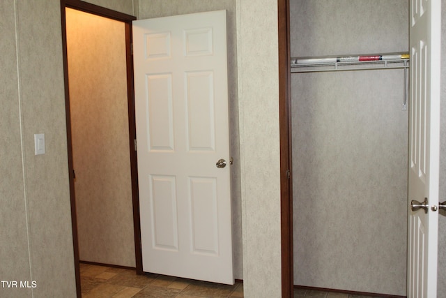 402 Beeline Rd, Duffield, VA 24244 - unfurnished bedroom featuring a closet and stone finish floors