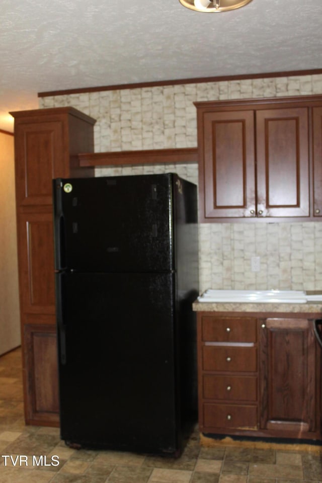402 Beeline Rd, Duffield, VA 24244 - kitchen with freestanding refrigerator and light countertops