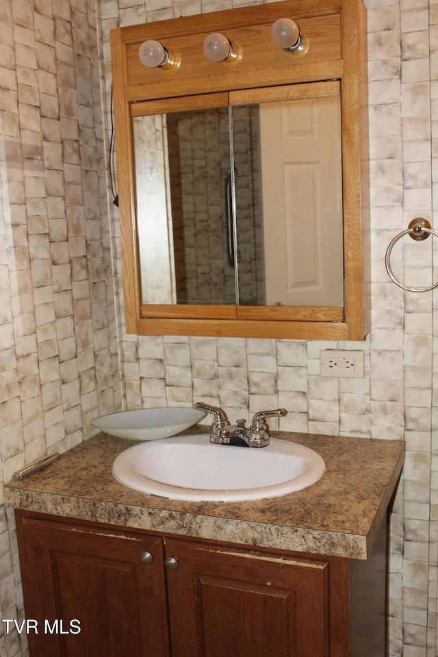 402 Beeline Rd, Duffield, VA 24244 - bathroom with vanity and backsplash