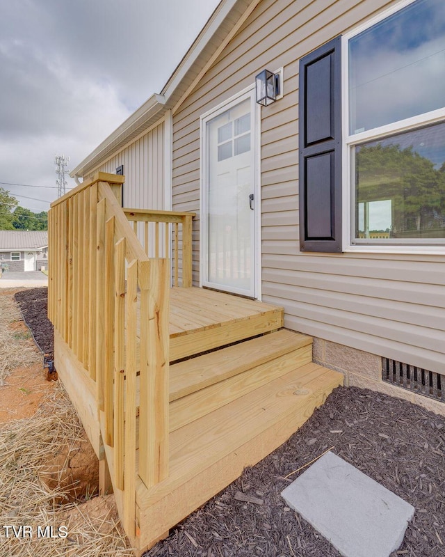 106 Iris Ln, Fall Branch, TN 37656 - doorway to property featuring a wooden deck and crawl space