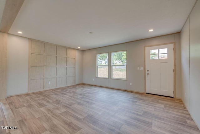 106 Iris Ln, Fall Branch, TN 37656 - unfurnished living room with light wood-style flooring, healthy amount of natural light, and recessed lighting