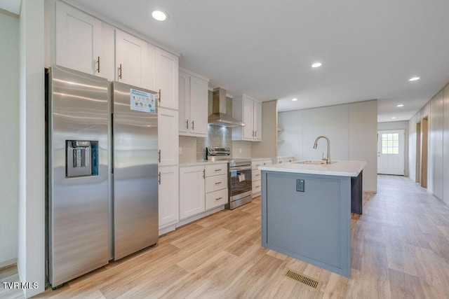 106 Iris Ln, Fall Branch, TN 37656 - kitchen featuring stainless steel appliances, light wood-style floors, white cabinetry, light countertops, and recessed lighting