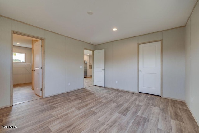 106 Iris Ln, Fall Branch, TN 37656 - unfurnished bedroom featuring light wood-style floors, recessed lighting, and crown molding