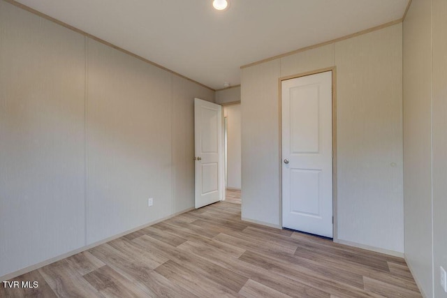 106 Iris Ln, Fall Branch, TN 37656 - unfurnished bedroom with light wood-style floors and crown molding