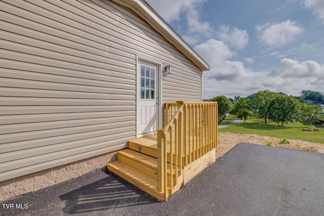 106 Iris Ln, Fall Branch, TN 37656 - view of exterior entry with a patio