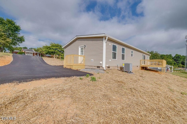 106 Iris Ln, Fall Branch, TN 37656 - view of home's exterior featuring crawl space and a deck