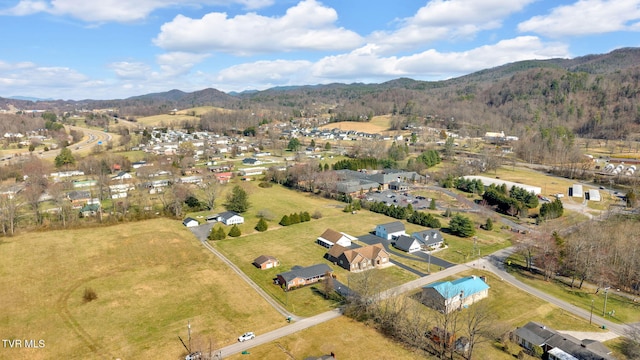 520 Lyle Rd, Erwin, TN 37650 - aerial view of property and surrounding area featuring mountains and nearby suburban area