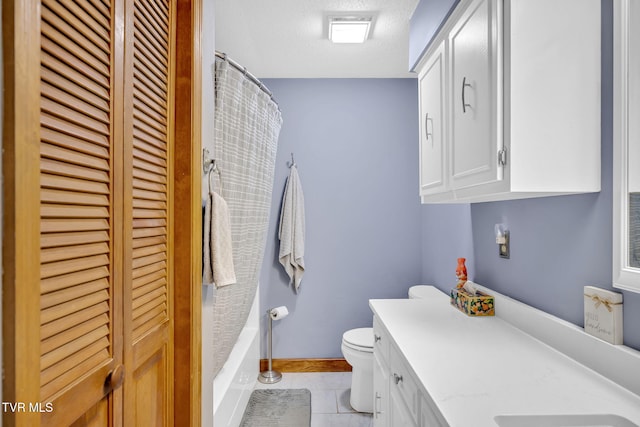 520 Lyle Rd, Erwin, TN 37650 - bathroom featuring a closet, vanity, tile patterned floors, a textured ceiling, and curtained shower