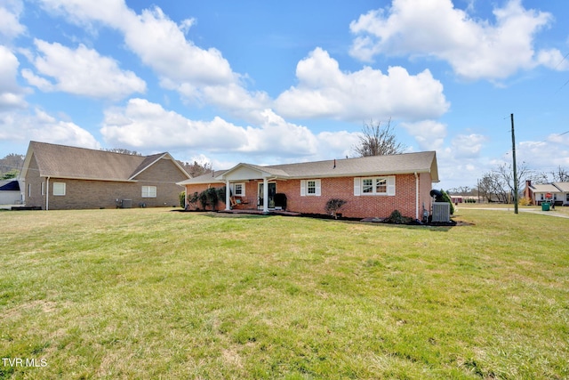 520 Lyle Rd, Erwin, TN 37650 - rear view of property featuring a yard and brick siding