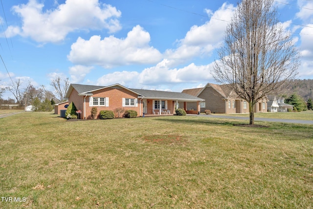 520 Lyle Rd, Erwin, TN 37650 - single story home featuring a front lawn, brick siding, and covered porch