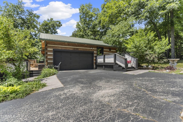 2169 Ranch Rd, Dandridge, TN 37725 - garage featuring asphalt driveway
