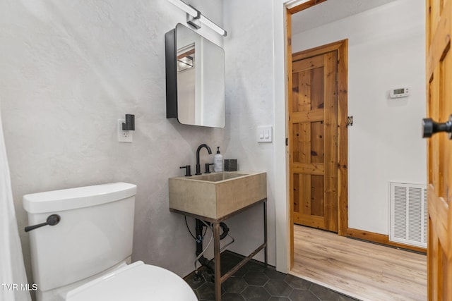 2169 Ranch Rd, Dandridge, TN 37725 - half bath with toilet and wood finished floors