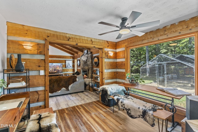 2169 Ranch Rd, Dandridge, TN 37725 - home office with wood finished floors, a ceiling fan, and a textured ceiling