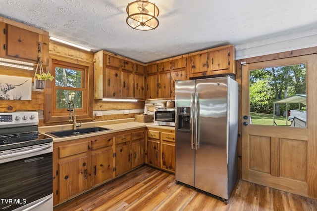 2169 Ranch Rd, Dandridge, TN 37725 - kitchen featuring stainless steel appliances, healthy amount of natural light, and light countertops