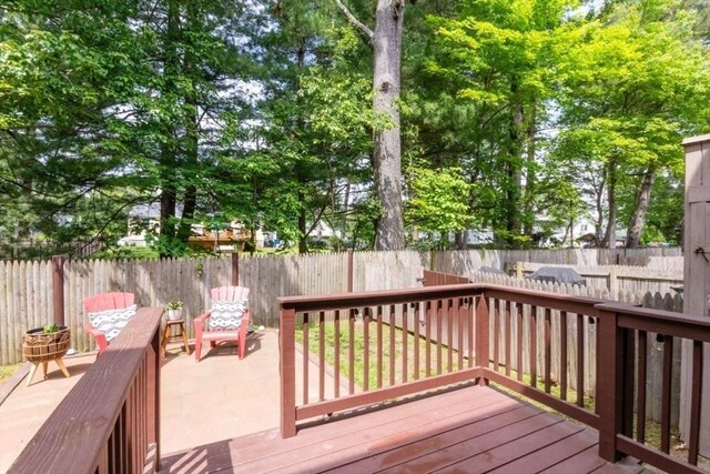 10 Grove Sq Unit 10, Randolph, MA 02368 - wooden deck with a fenced backyard