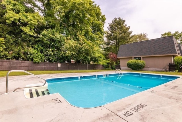 10 Grove Sq Unit 10, Randolph, MA 02368 - community pool with a patio area and view of scattered trees