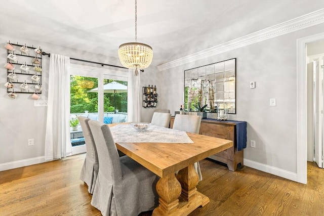 16 Lochmont St, North Attleboro, MA 02760 - dining area with wood finished floors, a chandelier, lofted ceiling, and crown molding