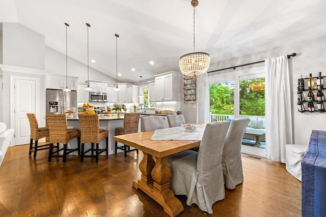 16 Lochmont St, North Attleboro, MA 02760 - dining room with dark wood-style flooring, a chandelier, high vaulted ceiling, and recessed lighting