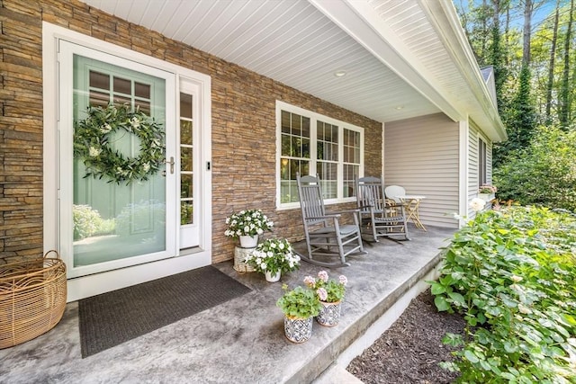 16 Lochmont St, North Attleboro, MA 02760 - view of exterior entry with a porch and stone siding