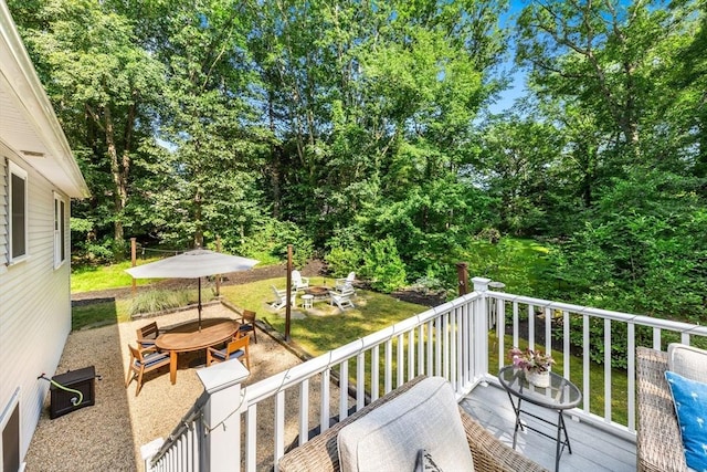 16 Lochmont St, North Attleboro, MA 02760 - wooden deck featuring an outdoor fire pit