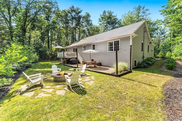 16 Lochmont St, North Attleboro, MA 02760 - back of house with a fire pit, a deck, a yard, and a patio