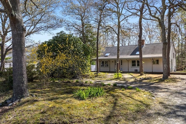 62 Monomoy Cir, Barnstable, MA 02632 - view of front of house with a chimney