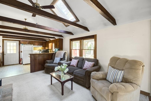 62 Monomoy Cir, Barnstable, MA 02632 - living room featuring healthy amount of natural light, light carpet, and ceiling fan