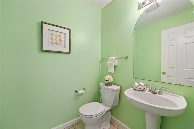 9 Edward Dr Unit 9, Grafton, MA 01536 - bathroom featuring toilet, tile patterned floors, baseboards, and a sink