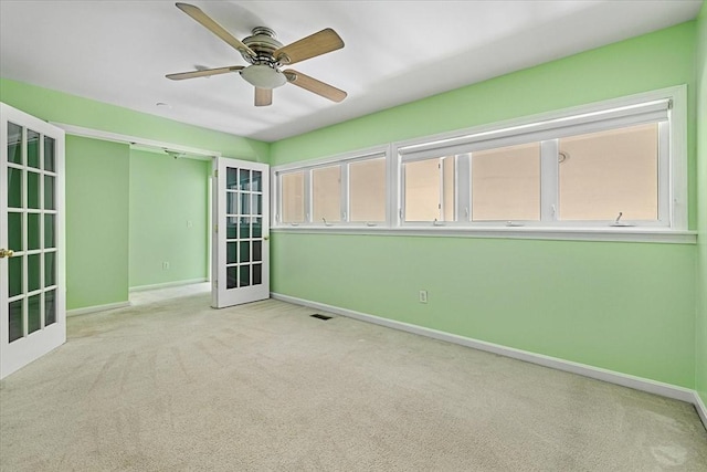9 Edward Dr Unit 9, Grafton, MA 01536 - unfurnished room with french doors, baseboards, ceiling fan, and carpet