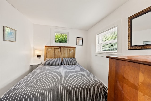 bedroom featuring multiple windows