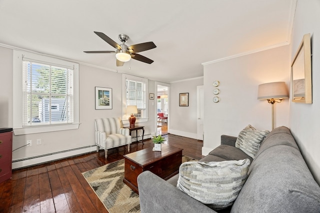 living room featuring ceiling fan, crown molding, dark hardwood / wood-style flooring, and a baseboard heating unit