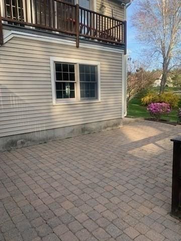 view of patio with a balcony