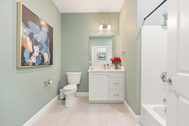 bathroom featuring baseboards, toilet, vanity, and shower / tub combination