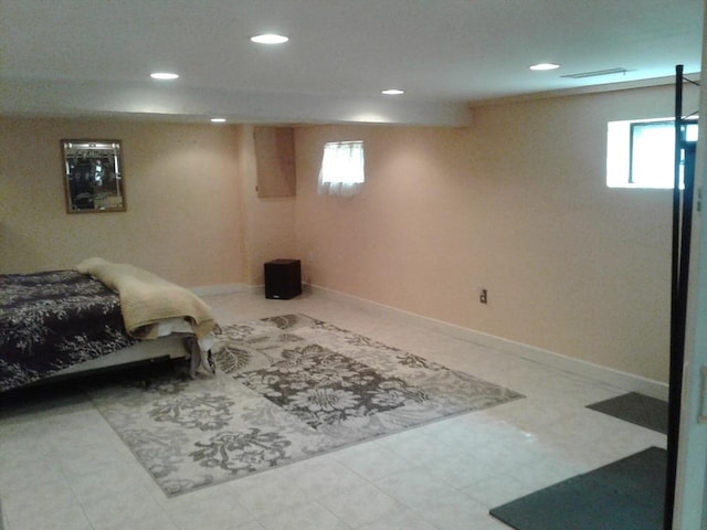 bedroom featuring recessed lighting and baseboards