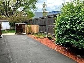 view of patio / terrace featuring fence