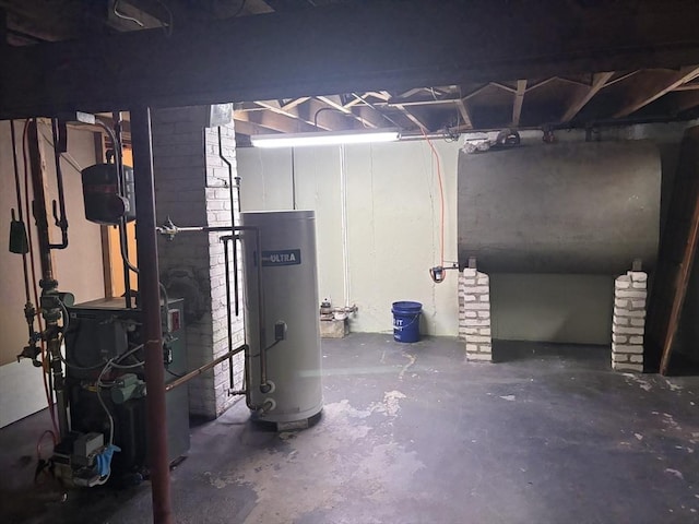unfinished below grade area featuring heating fuel and water heater