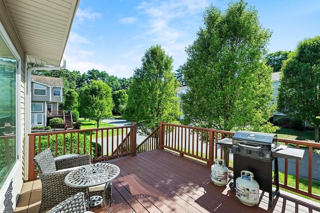 wooden terrace with grilling area