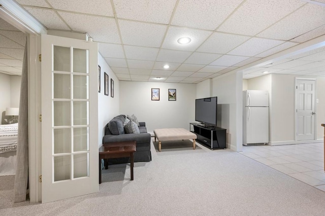 1051 Randolph Ave, Milton, MA 02186 - carpeted living room featuring a paneled ceiling, recessed lighting, and tile patterned flooring