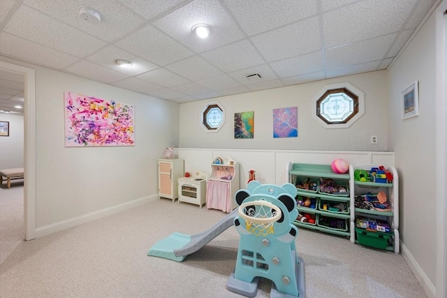 1051 Randolph Ave, Milton, MA 02186 - playroom with a drop ceiling, carpet flooring, and baseboards